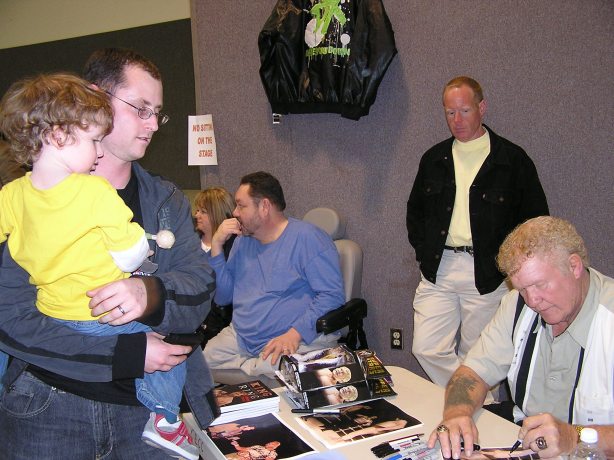 Harley Race makes an autograph out to my son, Jalen.  Jalen said, "thank you, Mr. Race", which of course made me proud.