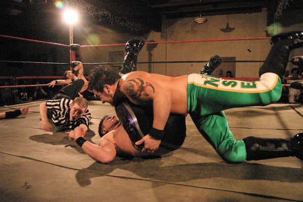 Ryan Cruz powers Steven Kenndy to the mat for a near fall late in the match. (Photo Credit: Michael R Van Hoogstraat)