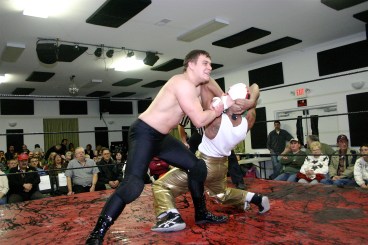 Junior Heavyweight Champion Dave Vaughn and Chucho have a test of strength. (Photo Credit: Michael R Van Hoogstraat)