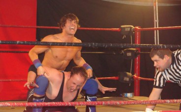 Nick Tyson struggles to defend a submission from Mike Sydal- Photo Credit Kari Williams 