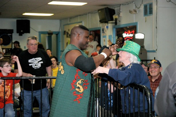 Gary Jackson and a fan celebrates ST Patricks Day together (Photo Credit Mike Van Hoogstraat)