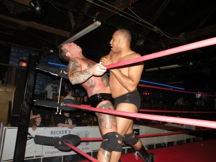 Curly is reeling from a big punch from Cage. 