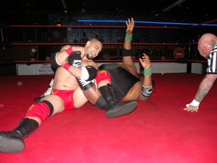 Hadeev wisely takes the big mans legs from underneath him. 