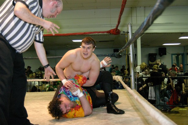 Dave Vaughn is determined as Bobby D gets to the ropes (Photo Credit Mike Van Hoogstraat)