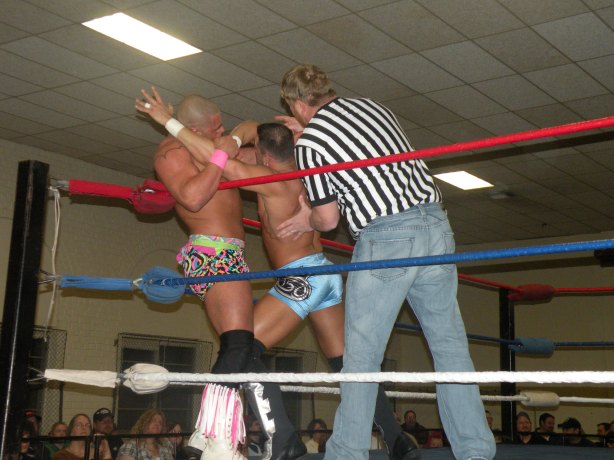 Trevor Murdoch tries to contain WLW Champion Steve Anthony and Marc Godeker in the corner. (Photo Credit Paul Alberson)