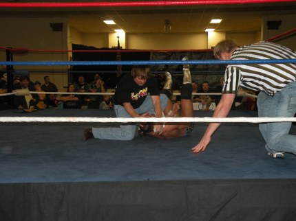 Roddy Piper works over Steve Anthony (Photo Credit Paul Alberson)