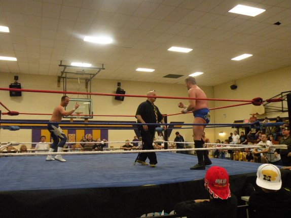 The mouse is trapped in the ring with Steve Fender and Trevor Murdoch. (Photo Credit: Brian “Flair” Kelley)