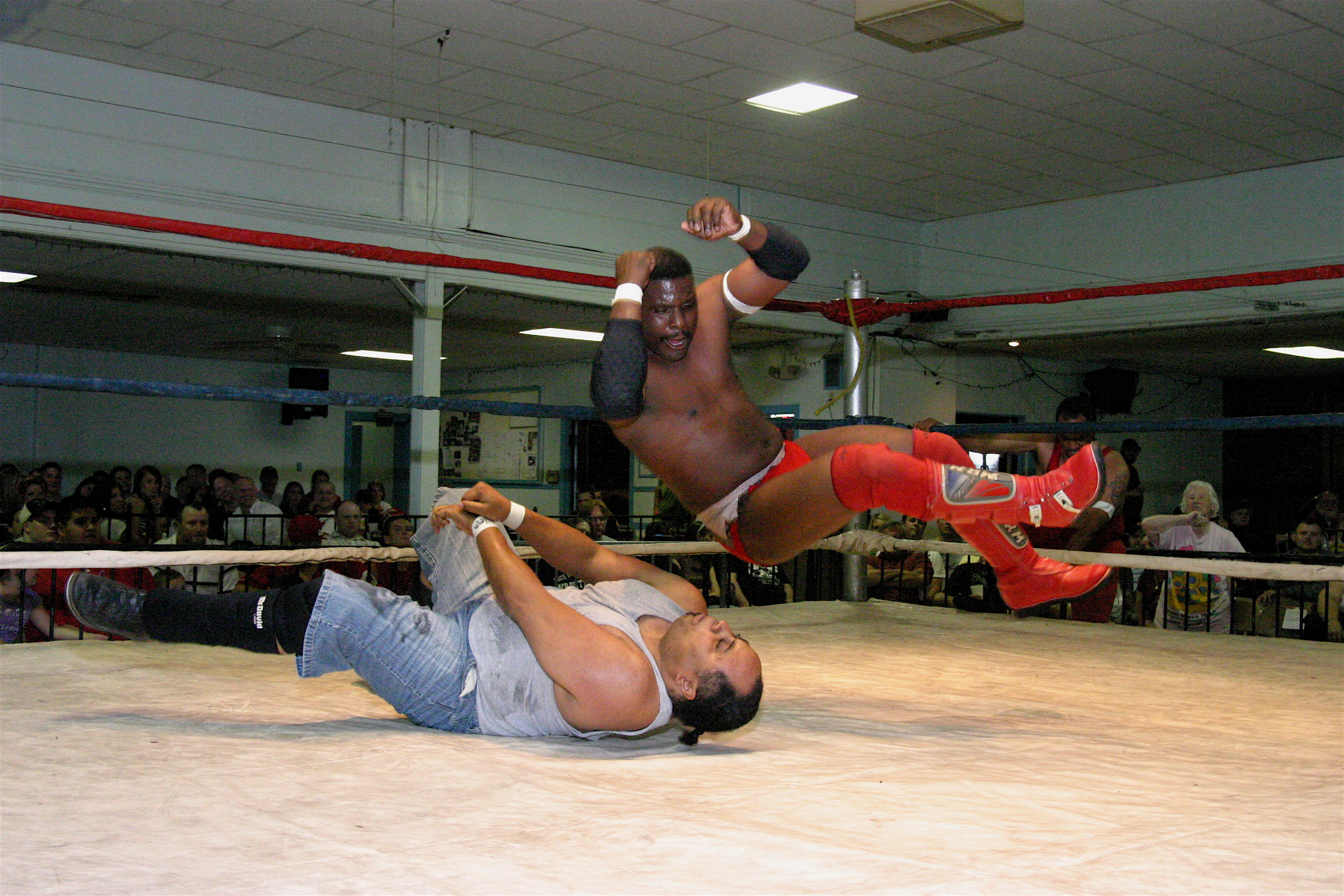 Gary Jackson delivers an elbow to an old “friend” (Photo Credit by Mike Van Hoogstratt)