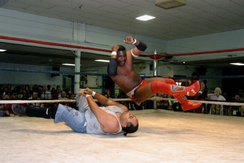 Gary Jackson delivers an elbow to an old “friend” (Photo Credit by Mike Van Hoogstratt)