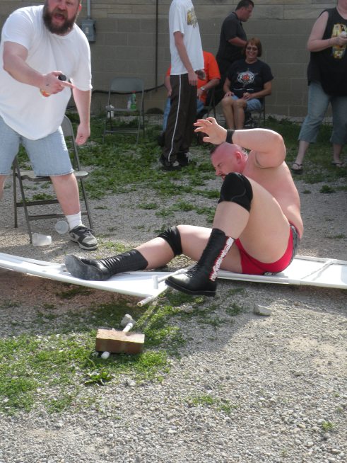 The war raged outside of the ring with the Madman sending Walker into gravel full force  (Photo Credit Brian “Flair” Kelley)