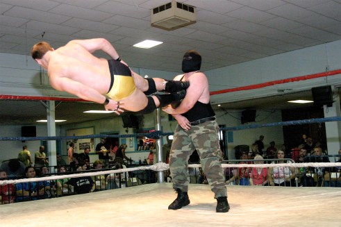 Waco goes flying after a drop kick by Vaughn. (Photo Credit Michael R Van Hoogstraat)