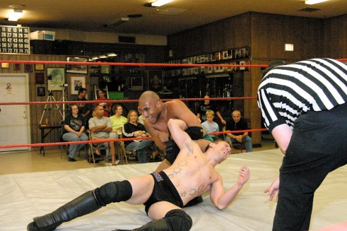  Matt Cage slows down the speedy Cage. (Photo Credit Michael R Van Hoogstraat)
