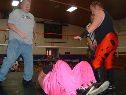 JC Michaels and Jaxson Pride double team Rex Gill after the match.(Photo Credit Brian “Flair” Kelley)