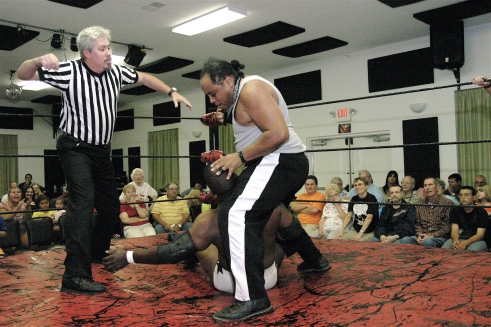 The MMWA-SICW Kingpin Phil E Blunt works over his arch enemy Gary Jackson (Photo Credit Michael R Van Hoogstraat)